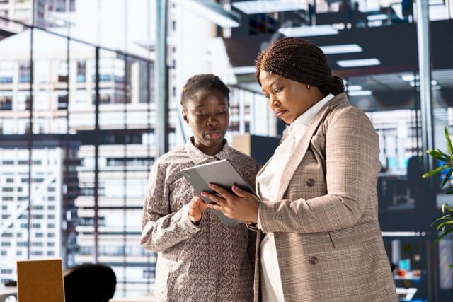 Business Associates Reviewing Objectives Large Medium