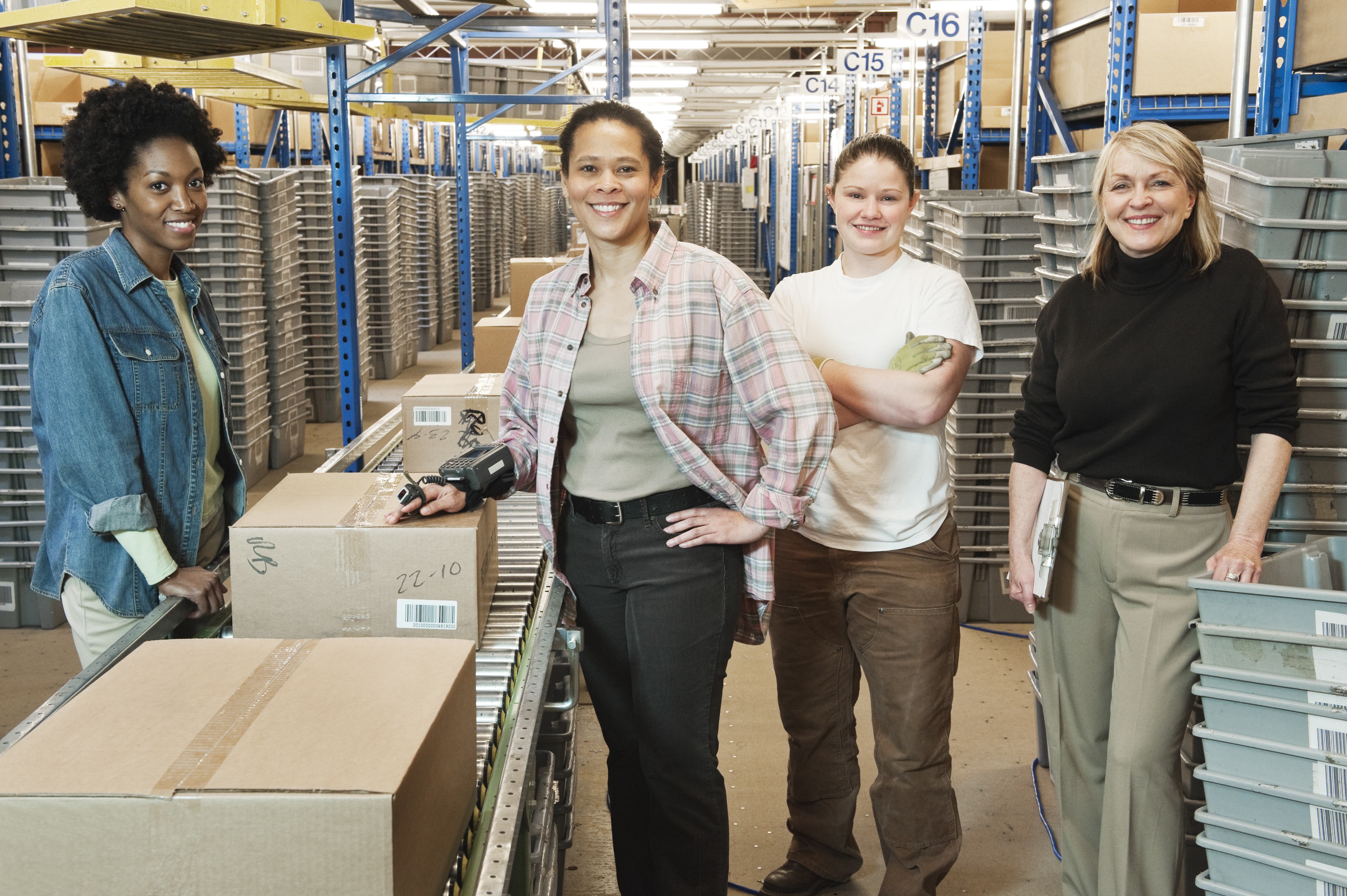 team-portrait-of-multi-ethnic-female-warehouse-wor-2023-11-27-05-28-55-utc